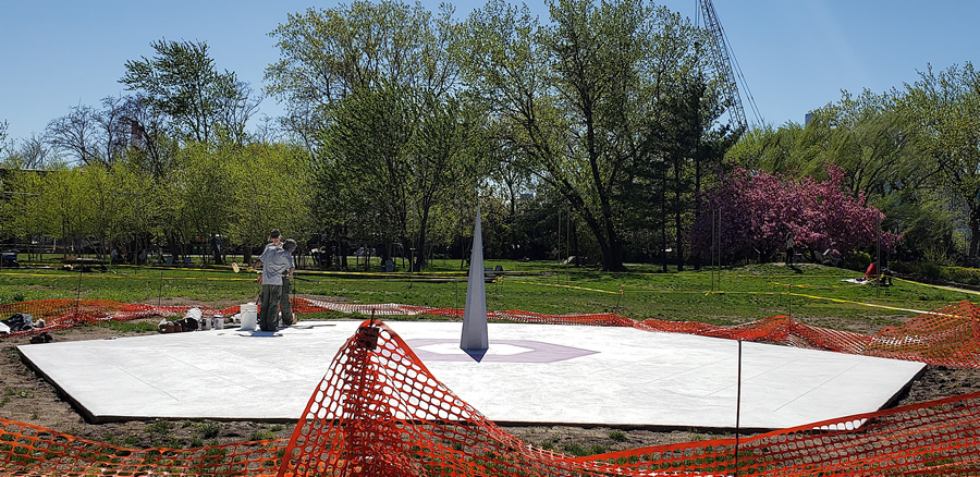 Artists working on an installation